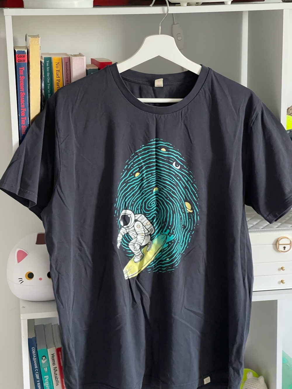 Men's Black Graphic Tee - Astronaut Surfing on Fingerprint,size Lorganic cotton